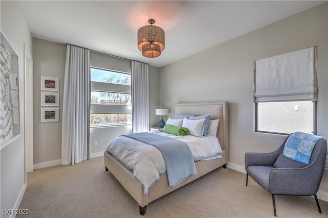 10 Sugarberry Ln, Las Vegas, NV 89135 - bedroom with light carpet and baseboards