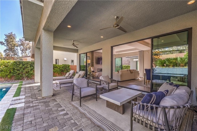 10 Sugarberry Ln, Las Vegas, NV 89135 - view of patio with an outdoor living space and ceiling fan