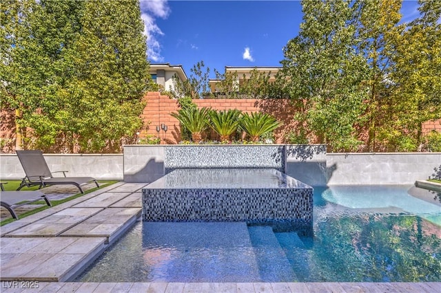 10 Sugarberry Ln, Las Vegas, NV 89135 - view of pool with a patio area