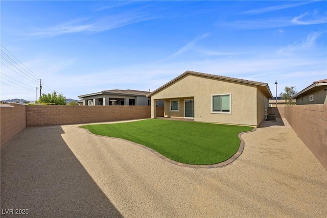 732 Rosewater Dr, Henderson, NV 89011 - rear view of house with stucco siding and a patio area