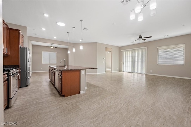 732 Rosewater Dr, Henderson, NV 89011 - kitchen featuring stainless steel appliances, open floor plan, recessed lighting, a ceiling fan, and baseboards