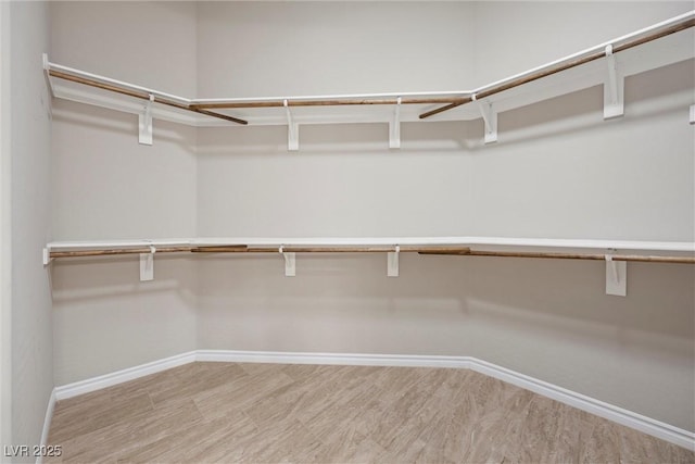 732 Rosewater Dr, Henderson, NV 89011 - spacious closet with wood finished floors