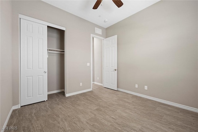 732 Rosewater Dr, Henderson, NV 89011 - unfurnished bedroom featuring a closet, baseboards, a ceiling fan, and wood finished floors