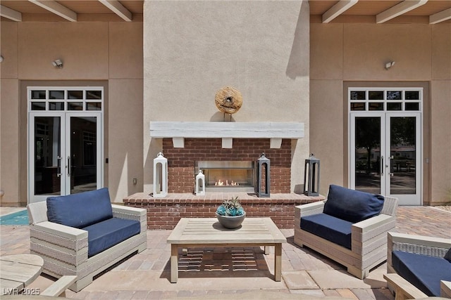 732 Rosewater Dr, Henderson, NV 89011 - view of patio with french doors and an outdoor living space with a fireplace