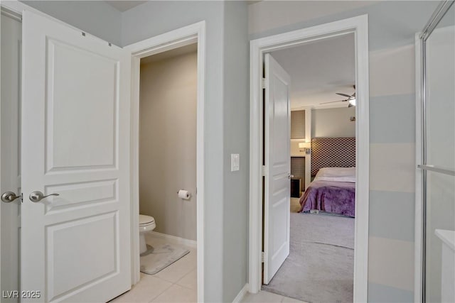 651 Penshaw Bridge Ave, Las Vegas, NV 89178 - ensuite bathroom featuring a ceiling fan, a stall shower, and tile patterned floors