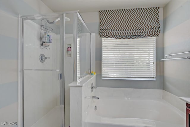 651 Penshaw Bridge Ave, Las Vegas, NV 89178 - bathroom with a garden tub, a stall shower, and vanity