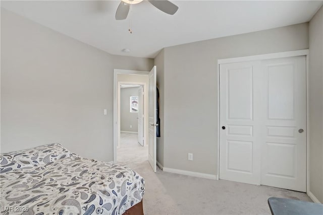 651 Penshaw Bridge Ave, Las Vegas, NV 89178 - bedroom featuring a closet, light carpet, and ceiling fan