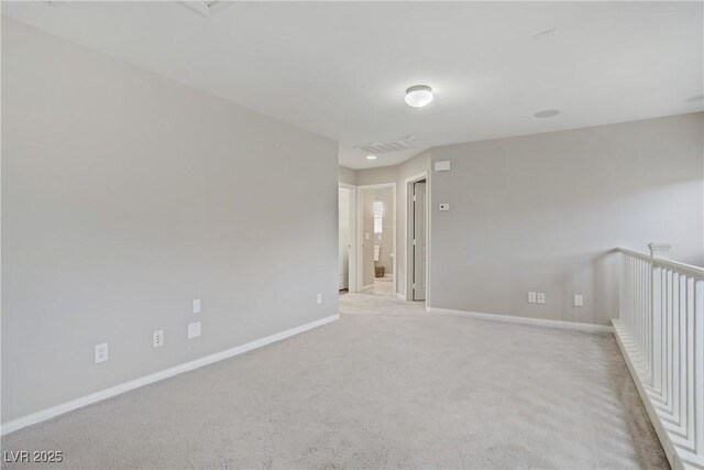 651 Penshaw Bridge Ave, Las Vegas, NV 89178 - empty room with baseboards and light colored carpet