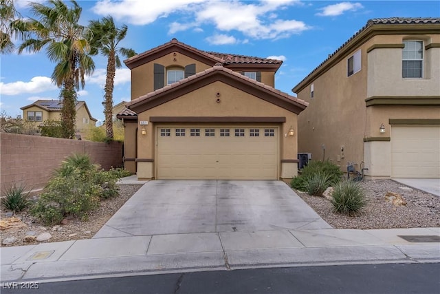 651 Penshaw Bridge Ave, Las Vegas, NV 89178 - mediterranean / spanish-style home with stucco siding, a tiled roof, driveway, and a garage