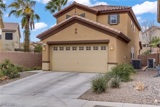 651 Penshaw Bridge Ave, Las Vegas, NV 89178 - mediterranean / spanish-style house with stucco siding, a tiled roof, driveway, and a garage