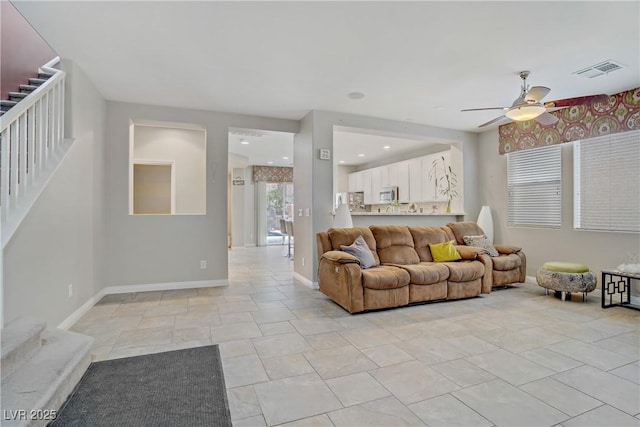 651 Penshaw Bridge Ave, Las Vegas, NV 89178 - living area featuring stairway and ceiling fan