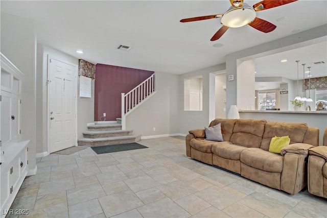 651 Penshaw Bridge Ave, Las Vegas, NV 89178 - living area featuring ceiling fan, stairs, healthy amount of natural light, and recessed lighting