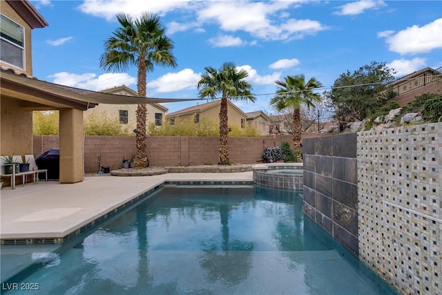 651 Penshaw Bridge Ave, Las Vegas, NV 89178 - view of pool featuring a patio area and a pool with connected hot tub