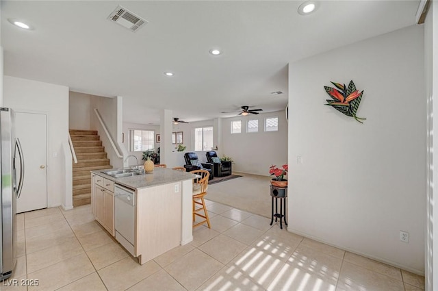 775 Wigan Pier Dr, Henderson, NV 89002 - kitchen featuring a wealth of natural light, a sink, dishwasher, open floor plan, and visible vents
