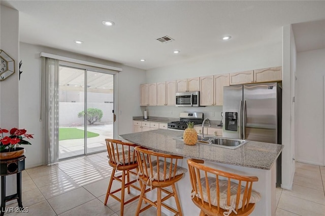 775 Wigan Pier Dr, Henderson, NV 89002 - kitchen featuring a kitchen bar, recessed lighting, a sink, visible vents, and appliances with stainless steel finishes