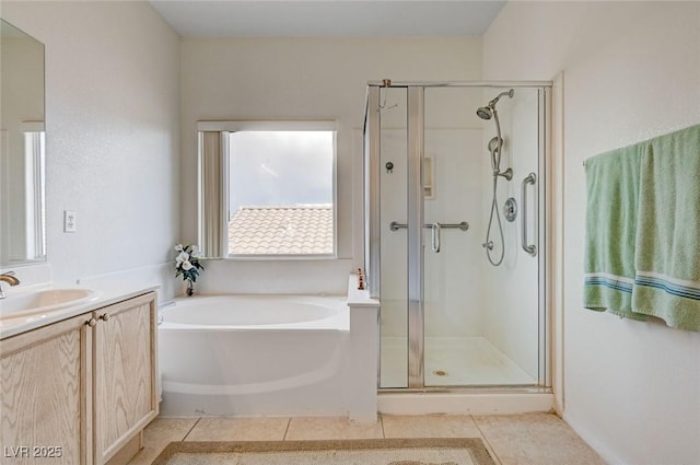 775 Wigan Pier Dr, Henderson, NV 89002 - full bathroom featuring a bath, vanity, tile patterned floors, and a shower stall