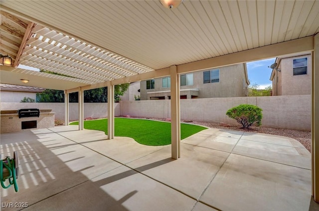 775 Wigan Pier Dr, Henderson, NV 89002 - view of patio / terrace with a fenced backyard, a grill, exterior kitchen, and a pergola