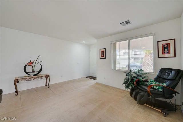 775 Wigan Pier Dr, Henderson, NV 89002 - living area with visible vents, tile patterned flooring, and carpet