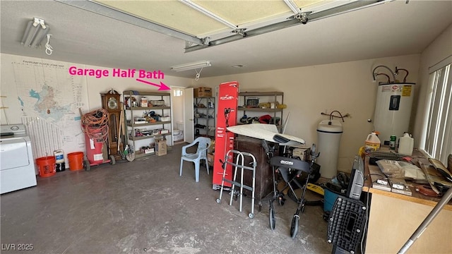 garage with washer / clothes dryer and electric water heater