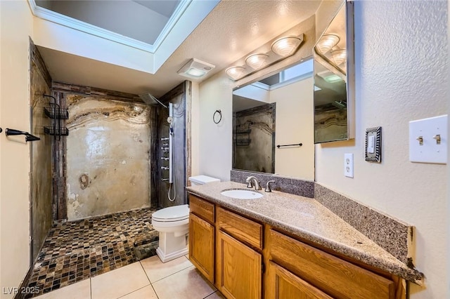 full bath with toilet, tile patterned floors, a shower stall, and vanity