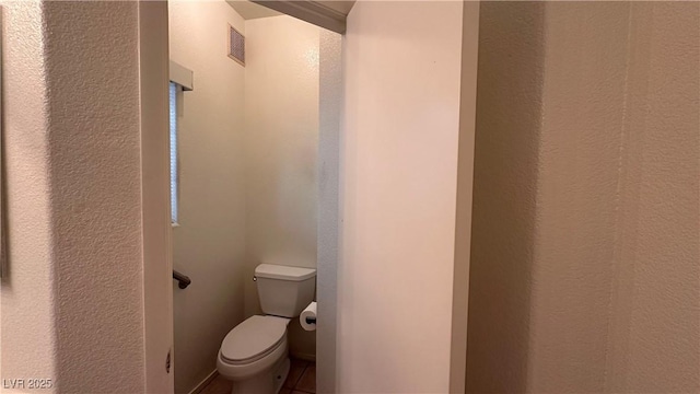 1947 Cutlass Dr Unit 0, Henderson, NV 89014 - bathroom with toilet, a textured wall, and visible vents