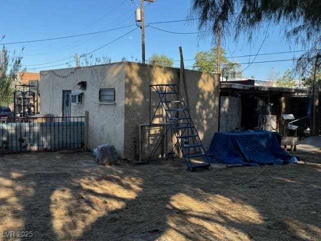 2520 Sunrise St, Las Vegas, NV 89101 - rear view of house featuring stucco siding