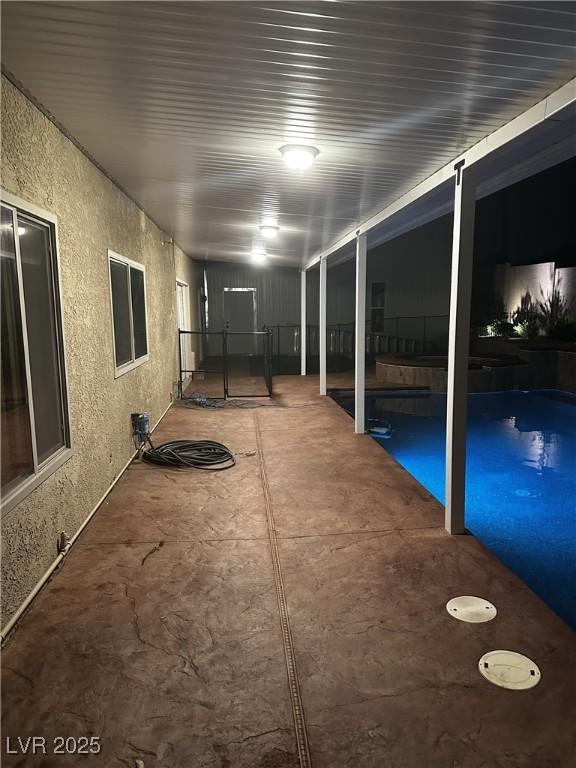 view of patio / terrace featuring an outdoor pool