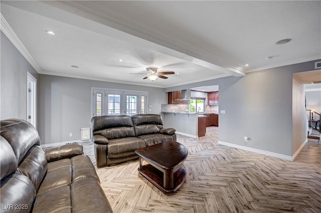 living area with crown molding, recessed lighting, baseboards, and ceiling fan