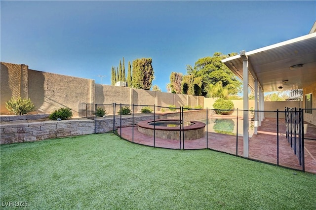view of yard featuring a patio and a fenced backyard