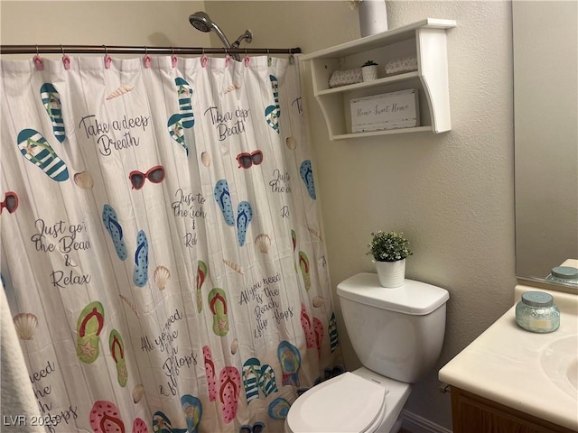 full bath with curtained shower, toilet, and vanity