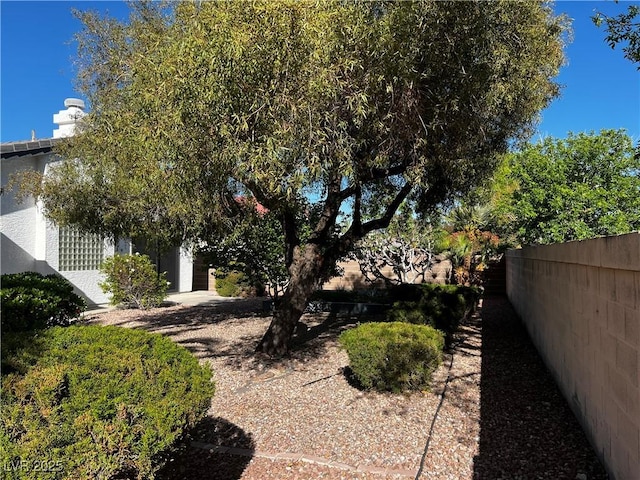 view of yard featuring fence