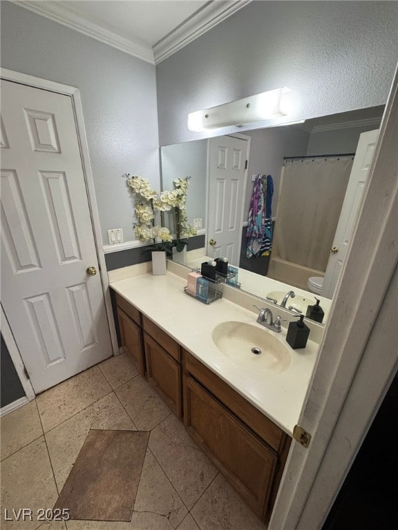 full bath featuring a shower with curtain, ornamental molding, tile patterned floors, and vanity