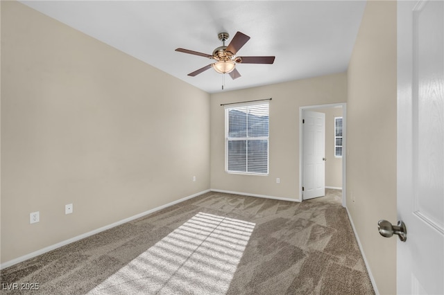 10550 W Alexander Rd Unit 2103, Las Vegas, NV 89129 - carpeted spare room with baseboards and ceiling fan