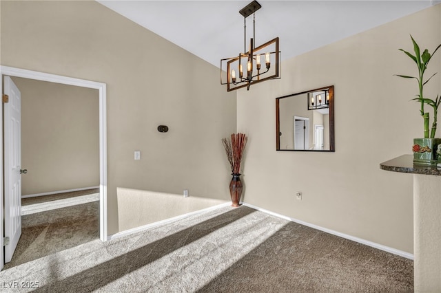 10550 W Alexander Rd Unit 2103, Las Vegas, NV 89129 - unfurnished dining area featuring carpet, a chandelier, and vaulted ceiling