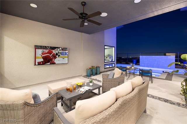 cinema featuring a ceiling fan and recessed lighting