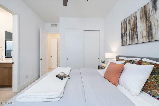 bedroom featuring connected bathroom, a closet, a ceiling fan, and visible vents