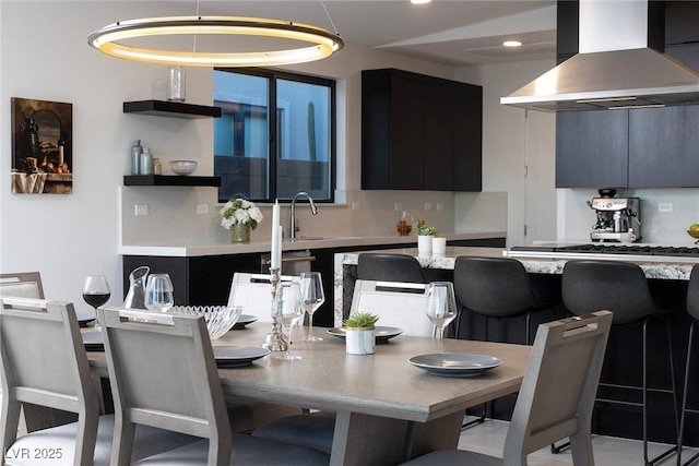 dining room featuring recessed lighting