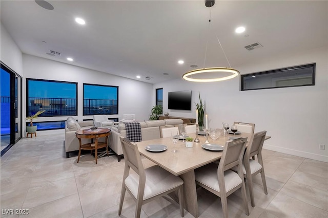 dining space with light tile patterned floors, visible vents, lofted ceiling, and recessed lighting