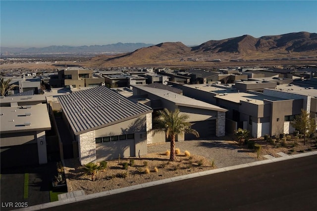 bird's eye view with a mountain view and a residential view