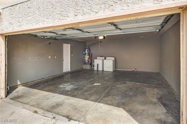 3350 Duece St, Las Vegas, NV 89121 - garage featuring secured water heater, washing machine and dryer, and a garage door opener