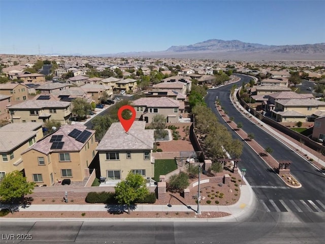bird's eye view with a residential view and a mountain view