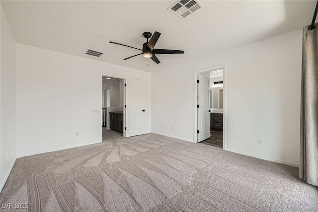 11913 Alava Ave, Las Vegas, NV 89138 - unfurnished bedroom with carpet flooring and connected bathroom
