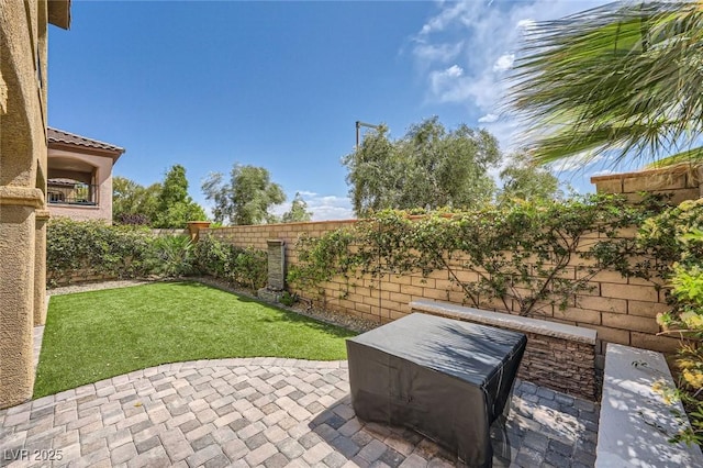 11913 Alava Ave, Las Vegas, NV 89138 - fenced backyard with a patio