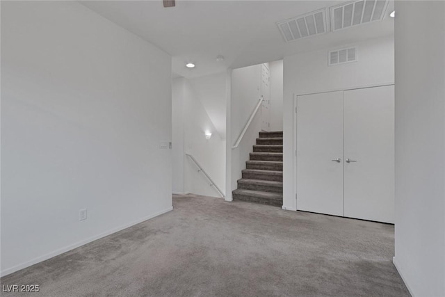 5589 Pico Ferrera Ct, Las Vegas, NV 89113 - unfurnished living room with carpet, baseboards, visible vents, and recessed lighting
