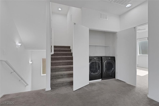 5589 Pico Ferrera Ct, Las Vegas, NV 89113 - interior space featuring separate washer and dryer, laundry area, visible vents, and carpet