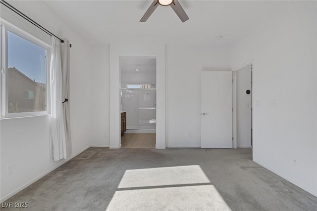 5589 Pico Ferrera Ct, Las Vegas, NV 89113 - unfurnished bedroom featuring ceiling fan, carpet flooring, ensuite bath, and baseboards