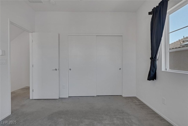 5589 Pico Ferrera Ct, Las Vegas, NV 89113 - unfurnished bedroom featuring carpet flooring and a closet