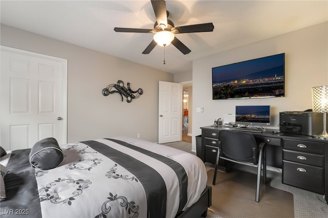 7900 Fossil Creek Ln Unit 103, Las Vegas, NV 89145 - bedroom with a ceiling fan and carpet