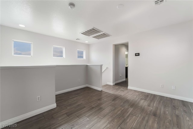 5940 Tamarack Lodge Ln, North Las Vegas, NV 89081 - spare room with baseboards, wood finished floors, visible vents, and recessed lighting