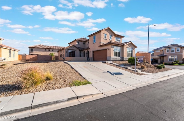5940 Tamarack Lodge Ln, North Las Vegas, NV 89081 - traditional-style house with a tiled roof, a residential view, stucco siding, an attached garage, and driveway